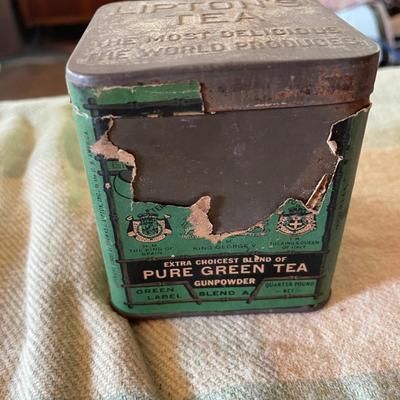 Lipton tea tin full of thread