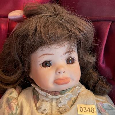 Sweet doll on stand