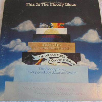 4 LP vinyl albums- 2 singles & 1 double album set