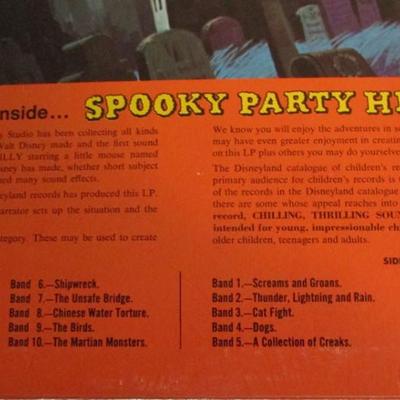 2 Disney records, 1 LP vinyl Halloween record, 1 LP vinyl Christmas