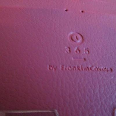 Franklin Covey binder, envelopes, 3-hole punch, business card holder, tape dispenser, pencil erasers, lists pad
