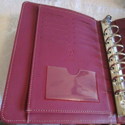 Franklin Covey binder, envelopes, 3-hole punch, business card holder, tape dispenser, pencil erasers, lists pad