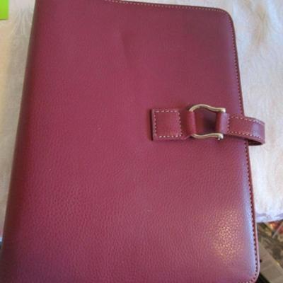Franklin Covey binder, envelopes, 3-hole punch, business card holder, tape dispenser, pencil erasers, lists pad