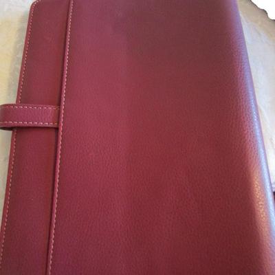 Franklin Covey binder, envelopes, 3-hole punch, business card holder, tape dispenser, pencil erasers, lists pad