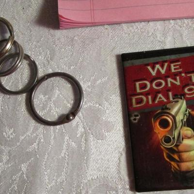 Small clock, retractable badge holders, 3-hole punch, key rings, magnets, crayons, stickers, coupon/recipe holder 3x5, 5 x 7 legal pad