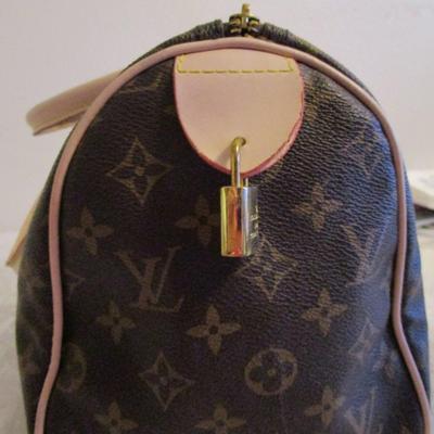 Faux Louis Vuitton handbag, Signice pink wallet