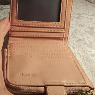 Faux Louis Vuitton handbag, Signice pink wallet