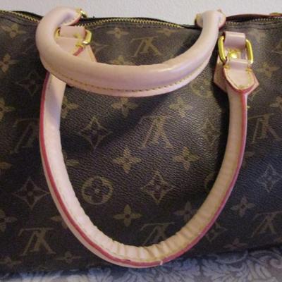 Faux Louis Vuitton handbag, Signice pink wallet
