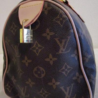 Faux Louis Vuitton handbag, Signice pink wallet