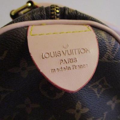Faux Louis Vuitton handbag, Signice pink wallet