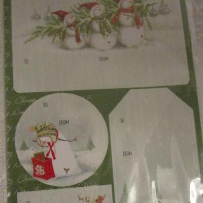 Tissue paper, gift bag, gnome, gloves, gift tags, earrings, stickers