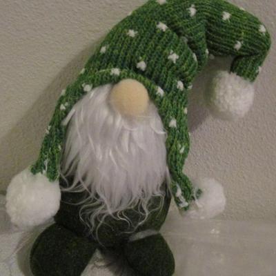Tissue paper, gift bag, gnome, gloves, gift tags, earrings, stickers