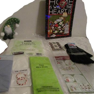 Tissue paper, gift bag, gnome, gloves, gift tags, earrings, stickers