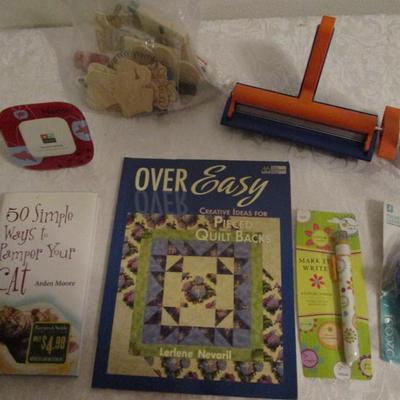 Scrapbooking paper crinklier, quilt book, wooden ornaments with paints, hand-held fan, tacky glue, scripture marker, picture frame,...