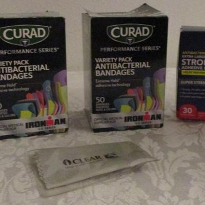 3 boxes bandages, lens cloth, extra absorbent abdominal pad