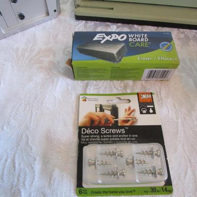 Shipping tape dispenser, 3-hole punch, Air duster, Expo eraser, picture hanging screws