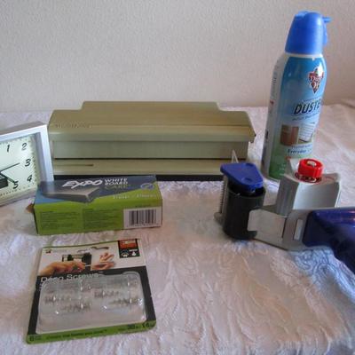 Shipping tape dispenser, 3-hole punch, Air duster, Expo eraser, picture hanging screws