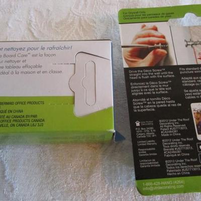Shipping tape dispenser, 3-hole punch, Air duster, Expo eraser, picture hanging screws