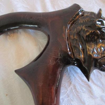 Wood carved buffalo head cane