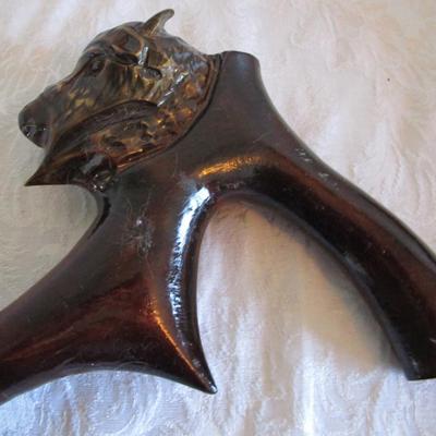Wood carved buffalo head cane