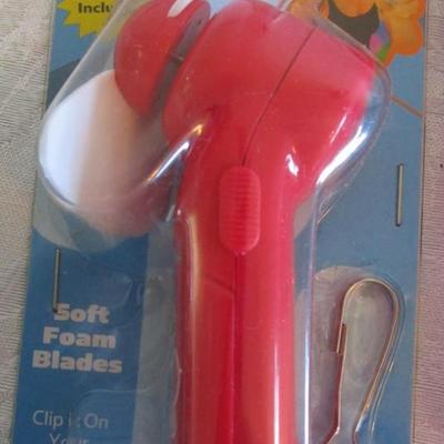 3 personal fans, emory boards, tweezers, shoe horn, extra large safety pin