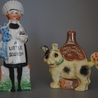 ANTIQUE PAIR OF CHARACTER PORCELAIN LIQUOR FLASKS