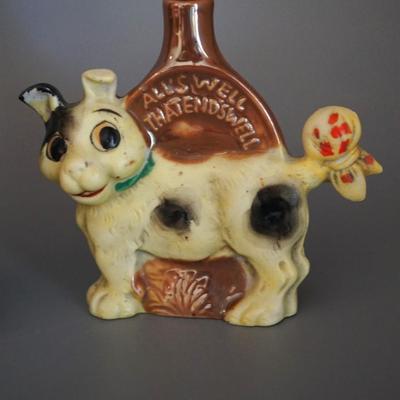 ANTIQUE PAIR OF CHARACTER PORCELAIN LIQUOR FLASKS