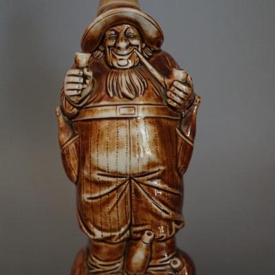 ANTIQUE GERMAN PORCELAIN BROWN GLAZED CHARACTER LIQUOR FLASK OF 6 1/2"