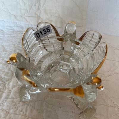 Jeannette with gold candle holder