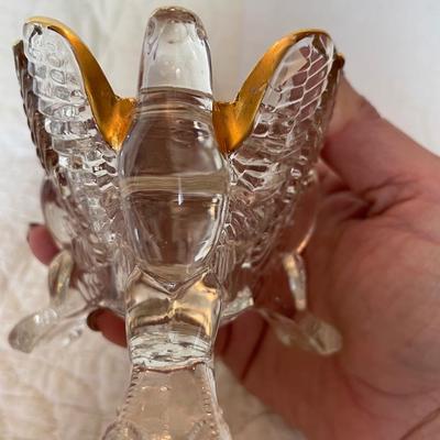 Jeannette with gold candle holder