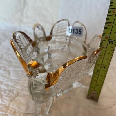 Jeannette with gold candle holder