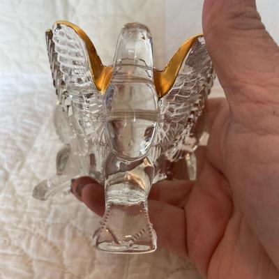 Jeannette with gold candle holder
