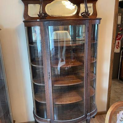 Curved glass bow front curio cabinet