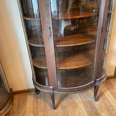 Curved glass bow front curio cabinet