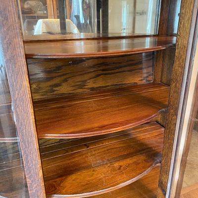 Curved glass bow front curio cabinet