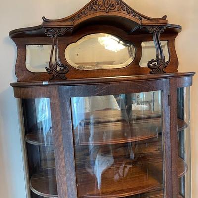 Curved glass bow front curio cabinet