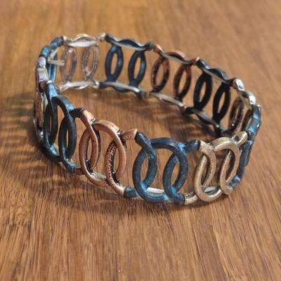Gunmetal, Gold Tone, and Copper Bracelet & (2) Pairs of Earrings