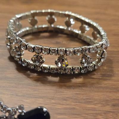 (2) Rhinestone Bracelets and a Pair of Earrings