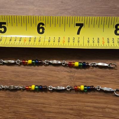 (2) Silver and Multicolored Beaded Bracelets