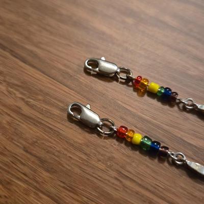 (2) Silver and Multicolored Beaded Bracelets