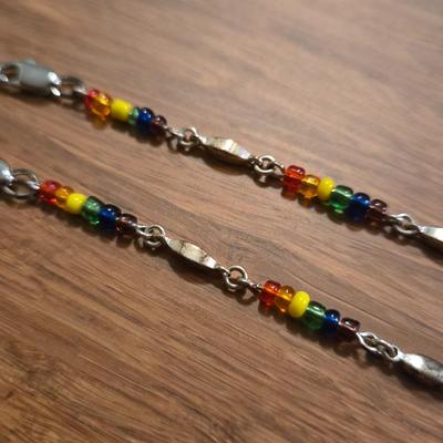 (2) Silver and Multicolored Beaded Bracelets