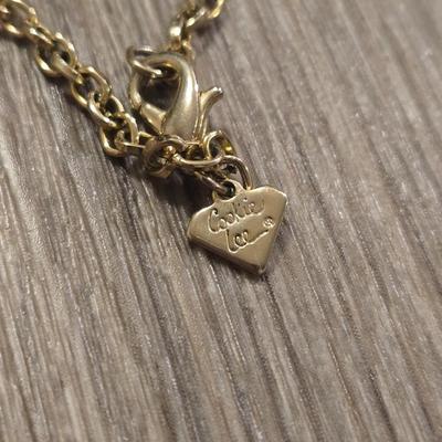 (2) Gold Tone Necklaces- one with Red & Peach Beads