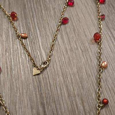 (2) Gold Tone Necklaces- one with Red & Peach Beads