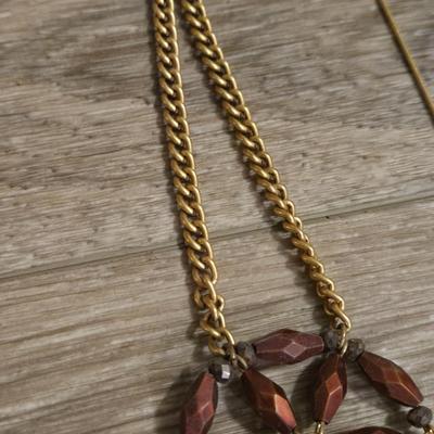 Gold Tone Necklaces- One is a Slider Necklaces and the other Bronze Beads