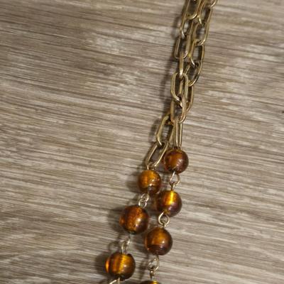 (2) Beaded Necklaces- One Black Beads and the other Amber Colored Beads