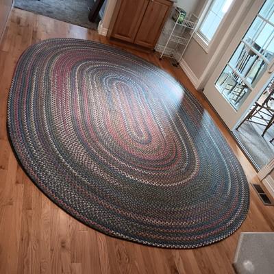 VERY NICE BRAIDED AREA RUG WITH A PAD