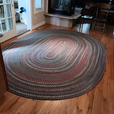 VERY NICE BRAIDED AREA RUG WITH A PAD