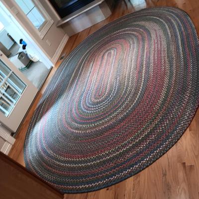 VERY NICE BRAIDED AREA RUG WITH A PAD