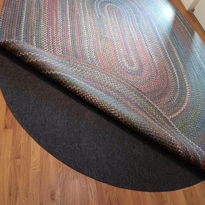 VERY NICE BRAIDED AREA RUG WITH A PAD