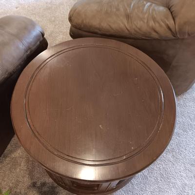 ROUND WOODEN END TABLE WITH STORAGE CABINET PLUS A FAUX PLANT